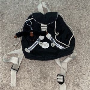 Kipling mini back pack/ black & cream